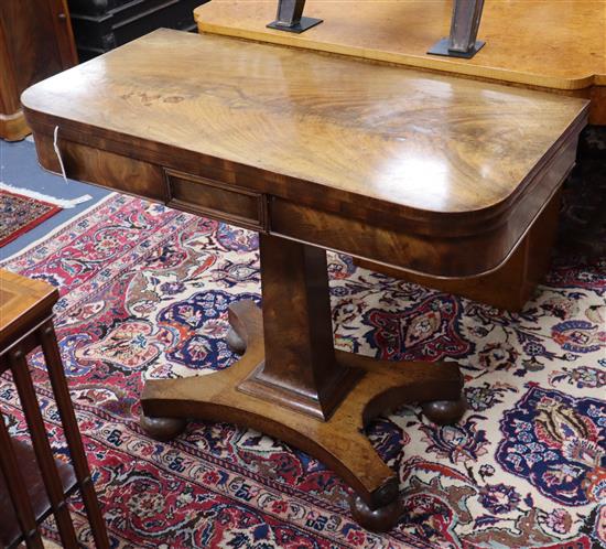 An early Victorian mahogany folding card table W.92cm